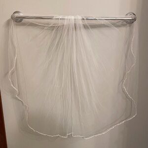 David’s Bridal veil, 30” long.